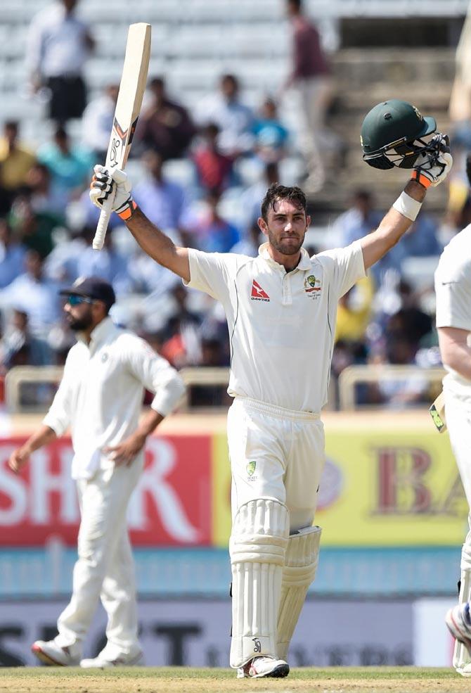 Australian batsman Glenn Maxwell (C) celebrates his century. Pic/AFP
