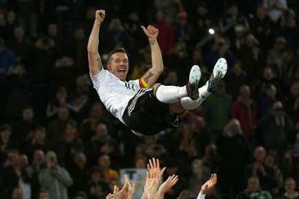 Fairytale end for Lukas Podolski as Germany defeat England 1-0