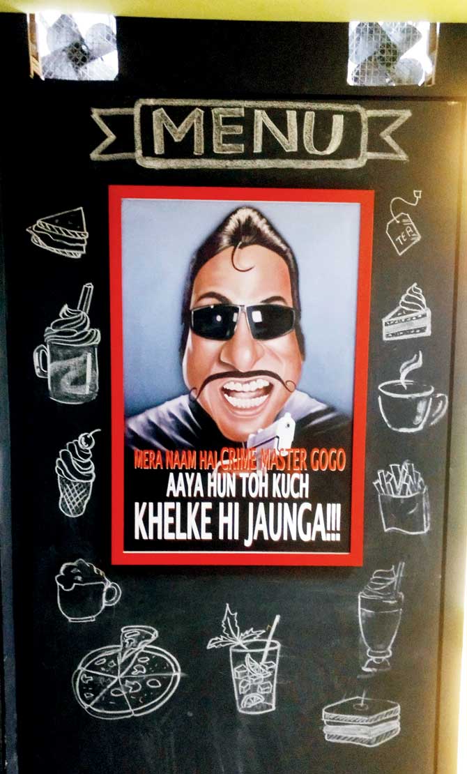 A caricature of Crime Master Gogo at the entrance of the café