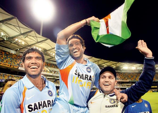 Pacer Munaf Patel (left), batting stars Sachin Tendulkar and Virender Sehwag celebrate India’s win over a formidable Australian outfit in the second final of CB Series at the Gabba in Brisbane on March 4, 2008
