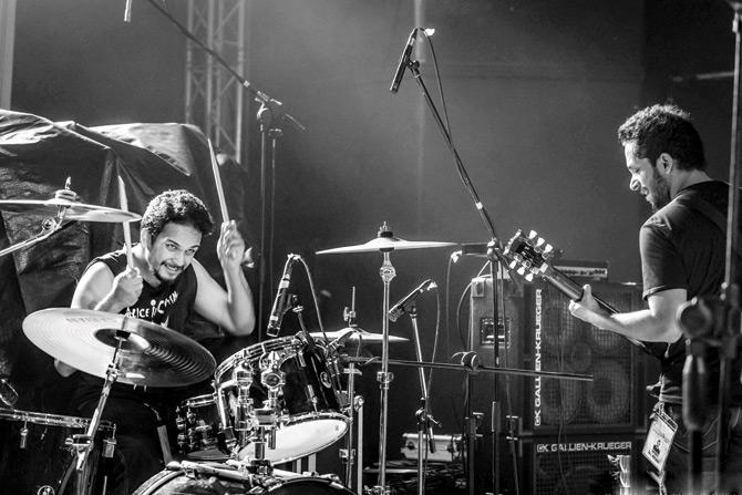 Pushkar Joshi (drums) and Kiron Kumar (guitar) in action at a Hellwind gig
