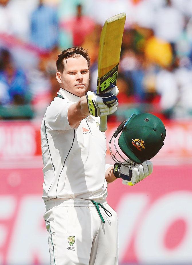 Australian captain Steven Smith celebrates after reaching his century in Dharamsala on Saturday. Pic/AFP