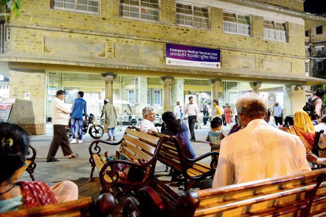 Patients wait outside KEM Hospital as doctors started getting back to work on Friday night. File Pic