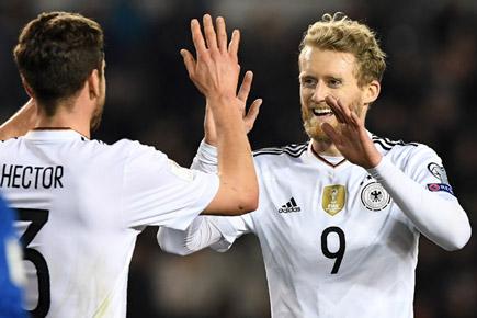 Germany keep perfect record, England down Lithuania in World Cup qualifiers