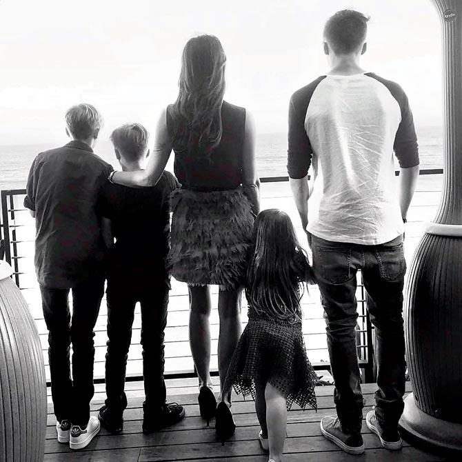 Becks also posted a pic of his wife Victoria with kids Brooklyn, Romeo, Cruz and Harper