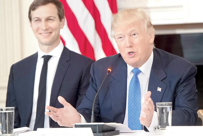 Jared Kushner with father-in-law Donald Trump. Pic/AFP
