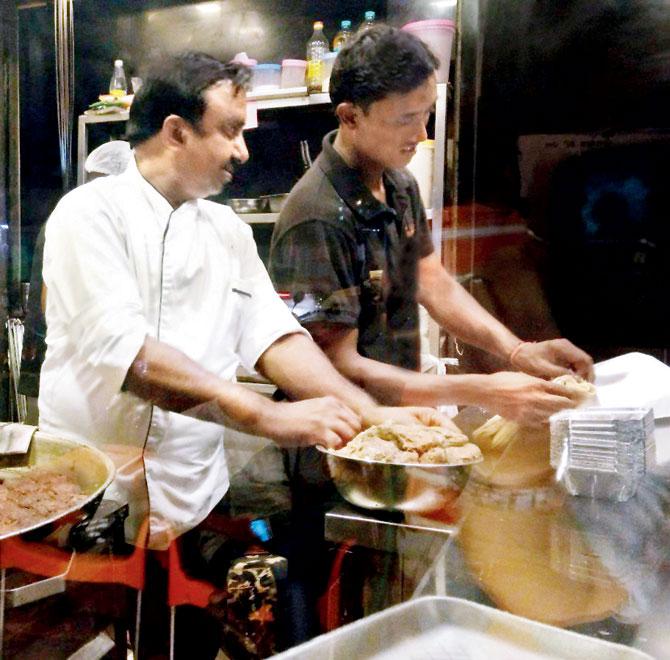 A staffer makes Tunday Kebabs in the open kitchen. Pics Courtesy/Yoshita Sengupta