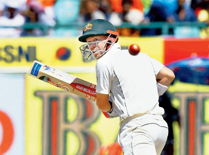 Australia’s David Warner plays a shot on Day Three of the fourth Test in Dharamsala yesterday. Pic/PTI