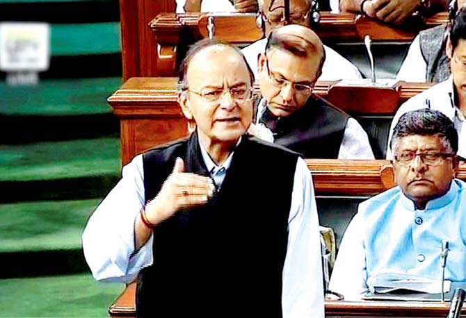 Finance Minister Arun Jaitley said GST will make commodities “slightly cheaper”. Pic/PTI