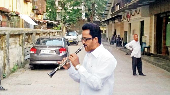 A member of Chaush Brass Band at Cotton Press Studio in Elphinstone