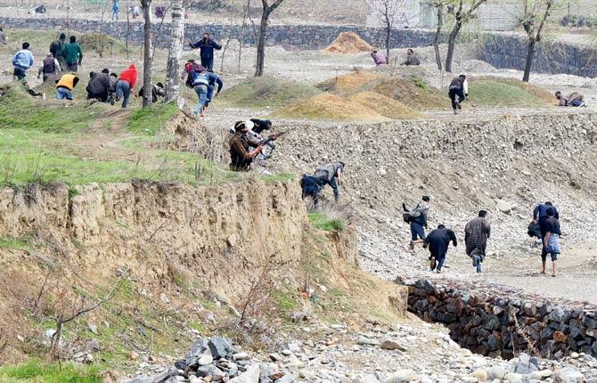 Three civilians died in the violence on Tuesday when protestors pelted stones at security personnel.
