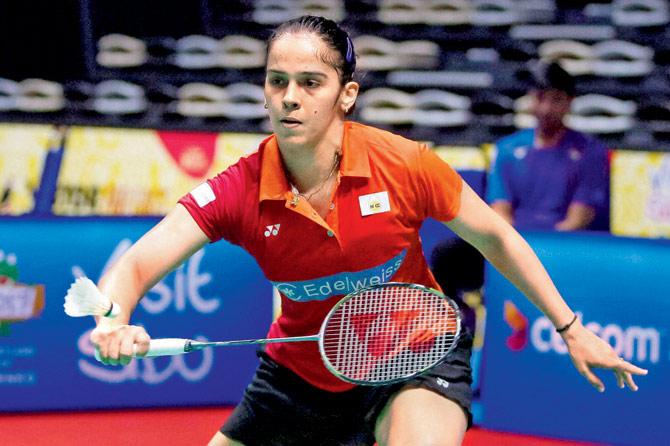 India’s Saina Nehwal eases to a 21-14, 21-12 win over Thailand’s Pornpawee Chochuwong yesterday. Pic/PTI