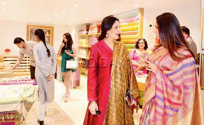 Anuradha Mahindra (in red) and owner Sagrika Rai (extreme right) at the store. Pic/Suresh karkera