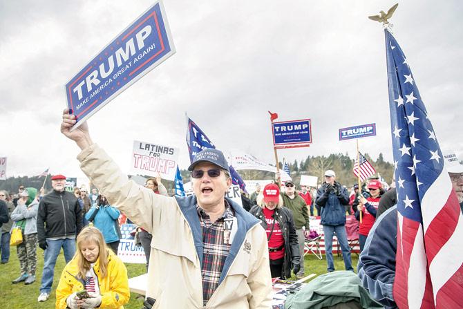 Supporter Chuck Prater in a Trump rally in Washington. There were approximately 200 supporters and 125 protesters. Pic/Getty Images/AFP