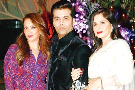 Spotted: New daddy Karan Johar with Seema Khan, Maheep Kapoor at a wedding
