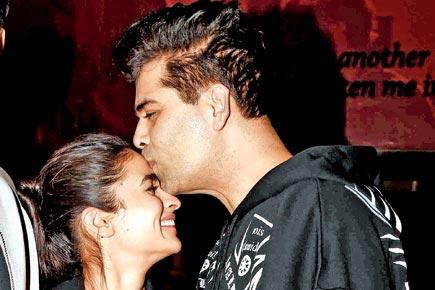 This photo of Karan Johar kissing Alia Bhatt will melt your heart