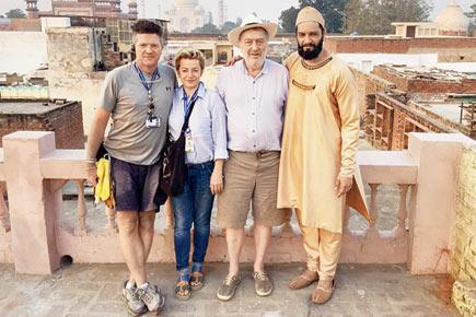 Ali Fazal poses with 'Victoria And Abdul' crew against the backdrop of Taj Mahal