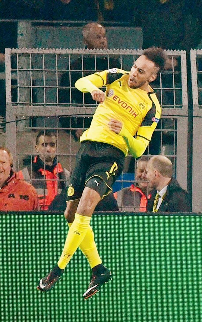 Borussia Dortmund striker Pierre-Emerick Aubameyang celebrates scoring his team’s opening goal against Benfica during the Champions League