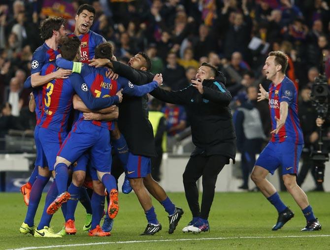 FC Barcelona players celebrate at the end of the UEFA Champions League. Pics/AFP