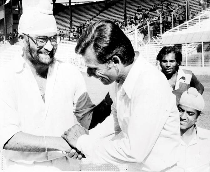 Delhi’s Bishan Singh Bedi and Padmakar Shivalkar greet each other after the 1980-81 Ranji Trophy final which Mumbai won at Wankhede Stadium. Pic/mid-day archives
