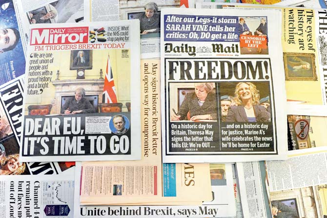 The front pages of UK daily newspapers reporting on the Brexit launch. Pic/AFP