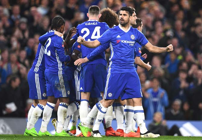 Chelsea players celebrate with Chelsea