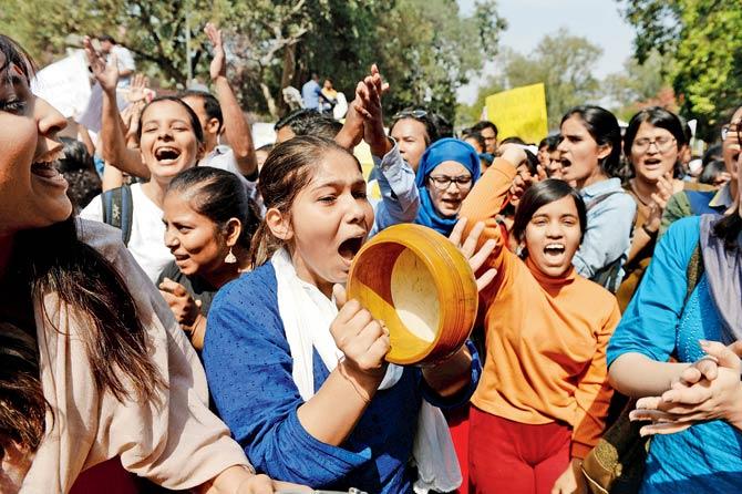 Students protest against the ABVP outside Delhi University. Pic/AFP