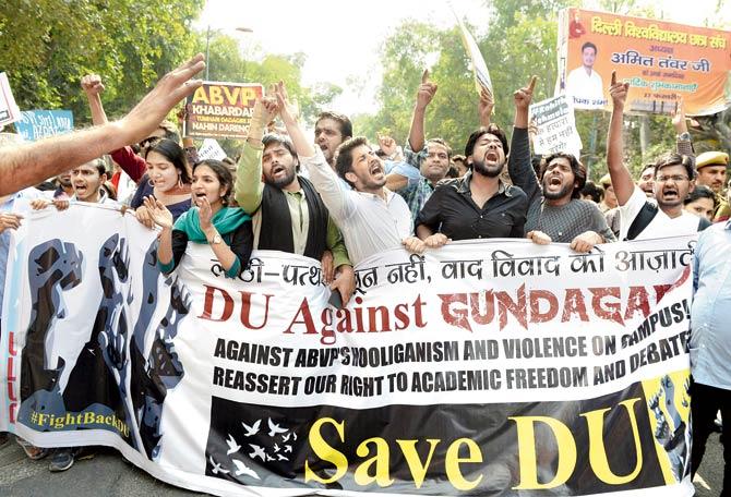 Students hold a protest march outside Delhi University against the ABVP. Pic/AFP
