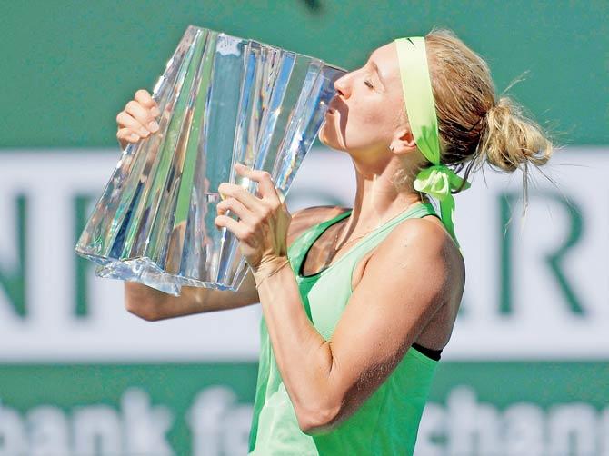 Russia’s Elena Vesnina kisses the Indian Wells trophy on Sunday. Pic/AFP