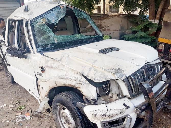 Mangled remains of the SUV the six Thane men were travelling in
