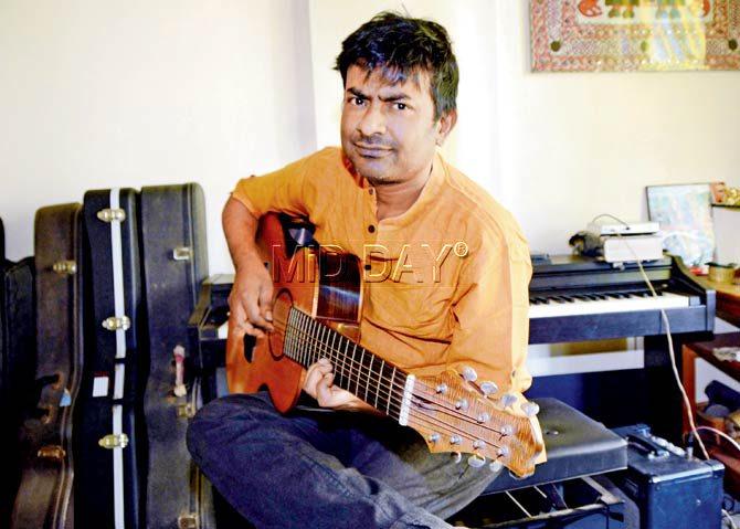 Guitarist Neil Mukherjee at his residence in Kalina. Pic/Sayed Sameer Abedi