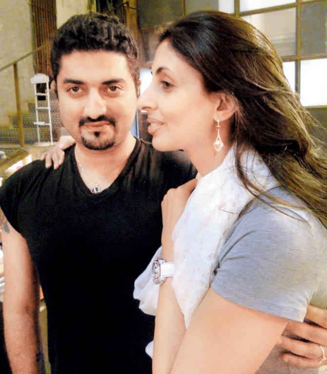 Hanut Singh with Shweta Bachchan wearing earrings from one of his previous collections