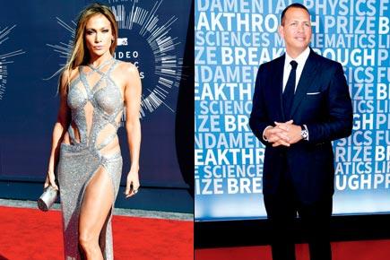 Jennifer Lopez and baseball beau Alex Rodriguez get cosy during exotic trip