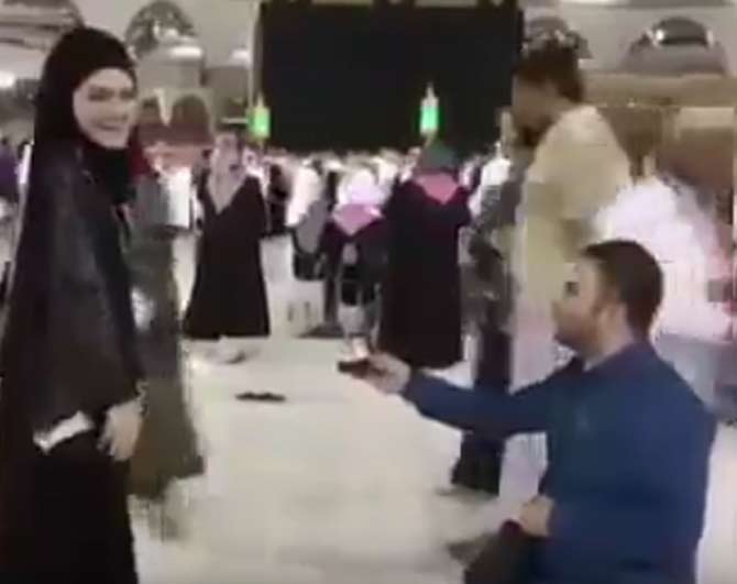 Turkish journalist proposes to girlfriend at the Holy Kaaba inside the Grand Mosque in Makkah.