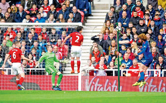 Man United’s Marouane Fellaini (right) heads to score his team’s first goal vs Middlesbrough during an EPL match yesterday. pic/Getty Images