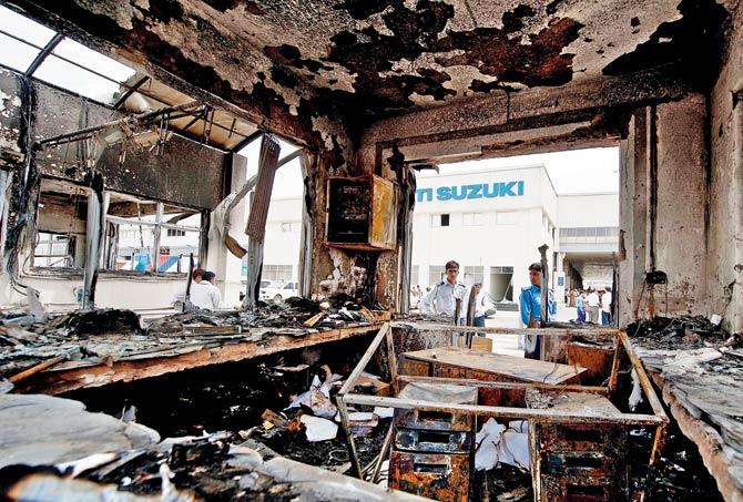 A file picture of the burnt reception at the factory. Pic/AFP