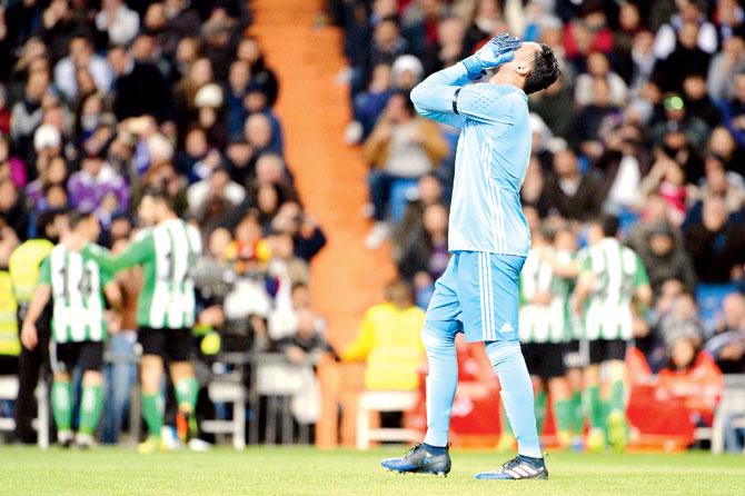 Real Madrid goalkeeper Keylor Navas is dejected after conceding a goal vs Real Betis on Sunday. pic/getty images