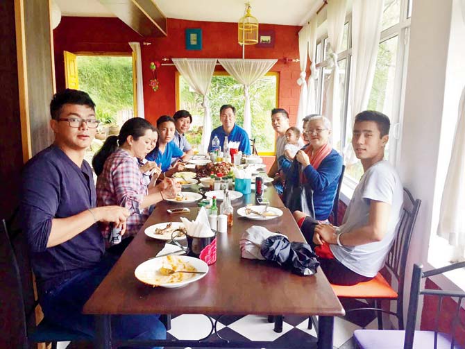 Spiritual leader’s family enjoys a meal at the actor’s restaurant in Dharamsala