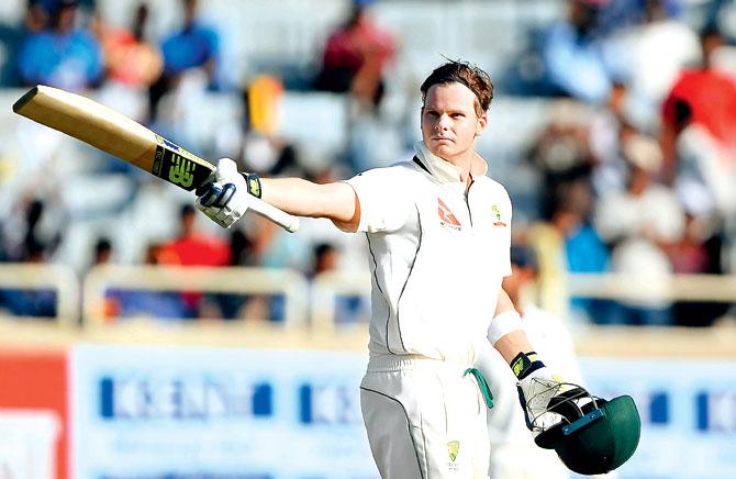 Australia’s captain Steven Smith celebrates his second century of the series against India on Day One of the third Test at the Jharkhand State Cricket Association (JSCA) Stadium in Ranchi yesterday. Pic/AFP