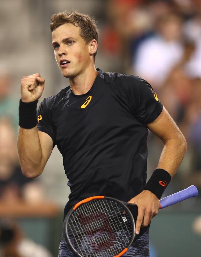 Vasek Pospisil of Canada celebrates a point during his straight sets victory against Andy Murray of Great Britain. Pic/AFP