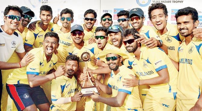 The Tamil Nadu team with the Vijay Hazare Trophy after beating Bengal by 37 runs in the final in New Delhi yesterday. Pic/PTI