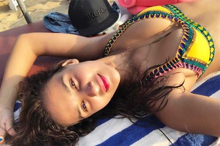 Photos: Neha Sharma's sister Aisha sizzles in yellow bikini