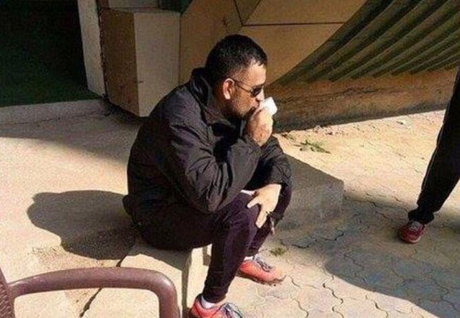 MS Dhoni having a cup of tea