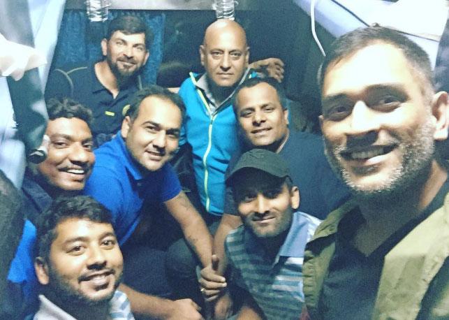 Dhoni and his Jharkhand teammates travelling by train