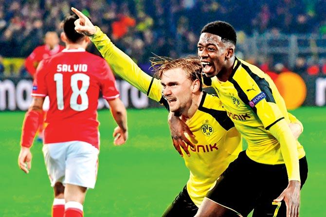 Borussia Dortmund players celebrate their win over Benfica in the Champions League encounter on WednesdayBorussia Dortmund players celebrate their win over Benfica in the Champions League encounter on Wednesday