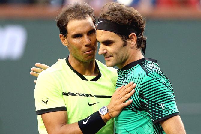 Rafael Nadal of Spain congratulates Roger Federer of Switzerland during the BNP Paribas Open at the Indian Wells Tennis Garden