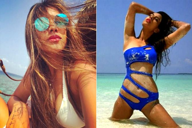 Beach babe! Nia Sharma's latest bikini pictures are taking the internet by  storm