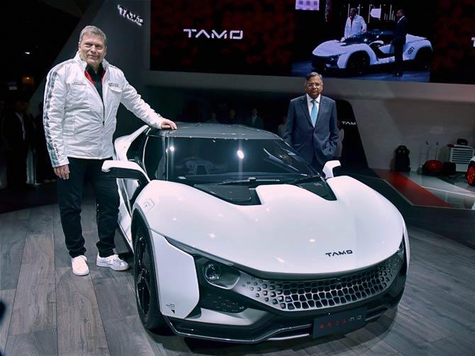 N Chandrasekaran, Chairman, Tata Sons and Guenter Butschek, CEO & MD, Tata Motors pose with TAMO Racemo, showcased at the 87th Geneva International Motor Show in Switzerland. Pic/PTI