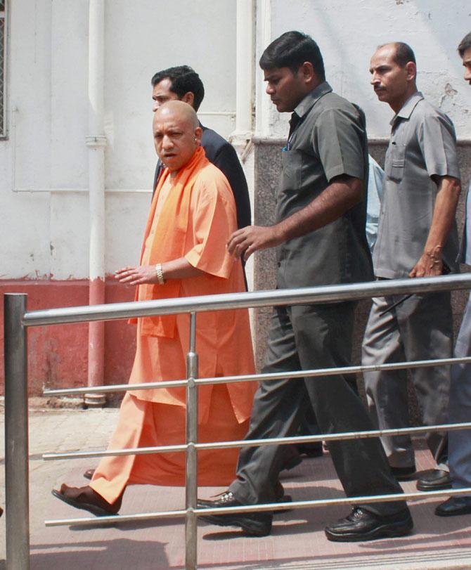 Uttar Pradesh Chief Minister Aditya Nath Yogi arrives at the Gandhi Ward of KGMU in Lucknow on Friday to meet a gang rape victim. The victim was also forced to drink acid in a moving train on the outskirts of Lucknow on Thursday. PTI 
