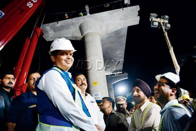CM inspired by city that never sleeps. It was way past midnight when Chief Minister Devendra Fadnavis arrived to watch Metro 7’s (Dahisar East to Andheri East) first U-girder being laid at Pathanwadi. The Western Express Highway was re-opened to traffic at 5 am after being closed through the night. Pics/Sayed Sameer Abedi